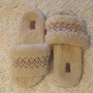 UGG Tan Fuzzy Slippers with Red Stitching
